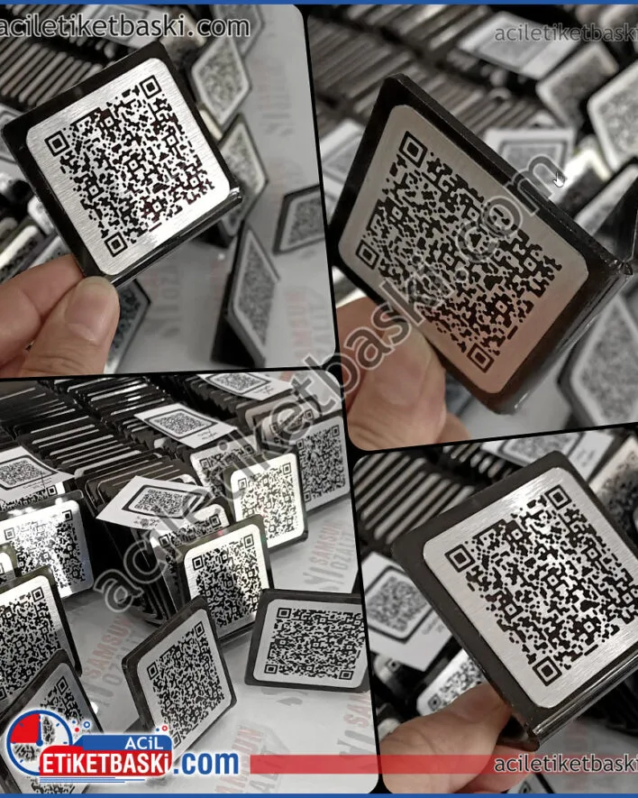 QR Kod etiket, masa üzeri, üçgen büküm, QR etiket baskısı, kaliteli ürün, stant şeklinde ayakta durur, hızlı üretim yapılır, aynı gün gönderim olur, acil QR masa menü etiket baskısı, üçgen büküm pleksi üzeri gümüş etiket ile QR baskısı yapılmıştır, ürün tabla alanı 6x6 cm dir, adede göre fiyat alınız QR Code label, table top, triangle twist, QR label printing, quality product, stands upright, fast production, same day shipping, urgent QR table menu label printing, QR printing is done with silver label on triangle twist plexiglass, product table area is 6x6 cm, get price according to quantity