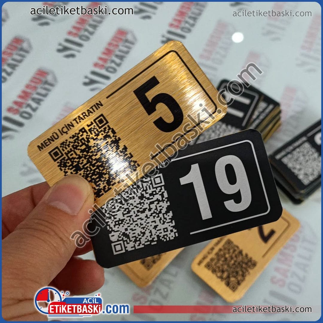 QR siyah etiket, QR altın rengi etiket, iç mekan ve dış mekan kullanım için, farklı ürünler kullanılmıştır, siyah metal QR kod baskılı ürün dış mekan için daha uygundur QR siyah etiket, QR altın rengi etiket, iç mekan ve dış mekan kullanım için, farklı ürünler kullanılmıştır, siyah metal QR kod baskılı ürün dış mekan için daha uygundur, QR menü, siyah dış mekan, Altın iç mekan kullanımı için tasarlandı, masa numarası ile birlikte QR menü yönlendirme kodu basılmıştır, arkası bantlıdır, kullanılacak yere göre malzeme yönlendirmesi yapılır, hızlı üretim aynı gün gönderim, yurt dışı kargo yapılır, acil etiket baskı merkezi QR black label, QR gold color label, for indoor and outdoor use, different products are used, black metal QR code printed product is more suitable for outdoor use, QR menu, black outdoor, Gold is designed for indoor use, QR menu direction code is printed with table number, back is tape, material direction is made according to where it will be used, fast production, same day shipping, international cargo is made, urgent label printing center
