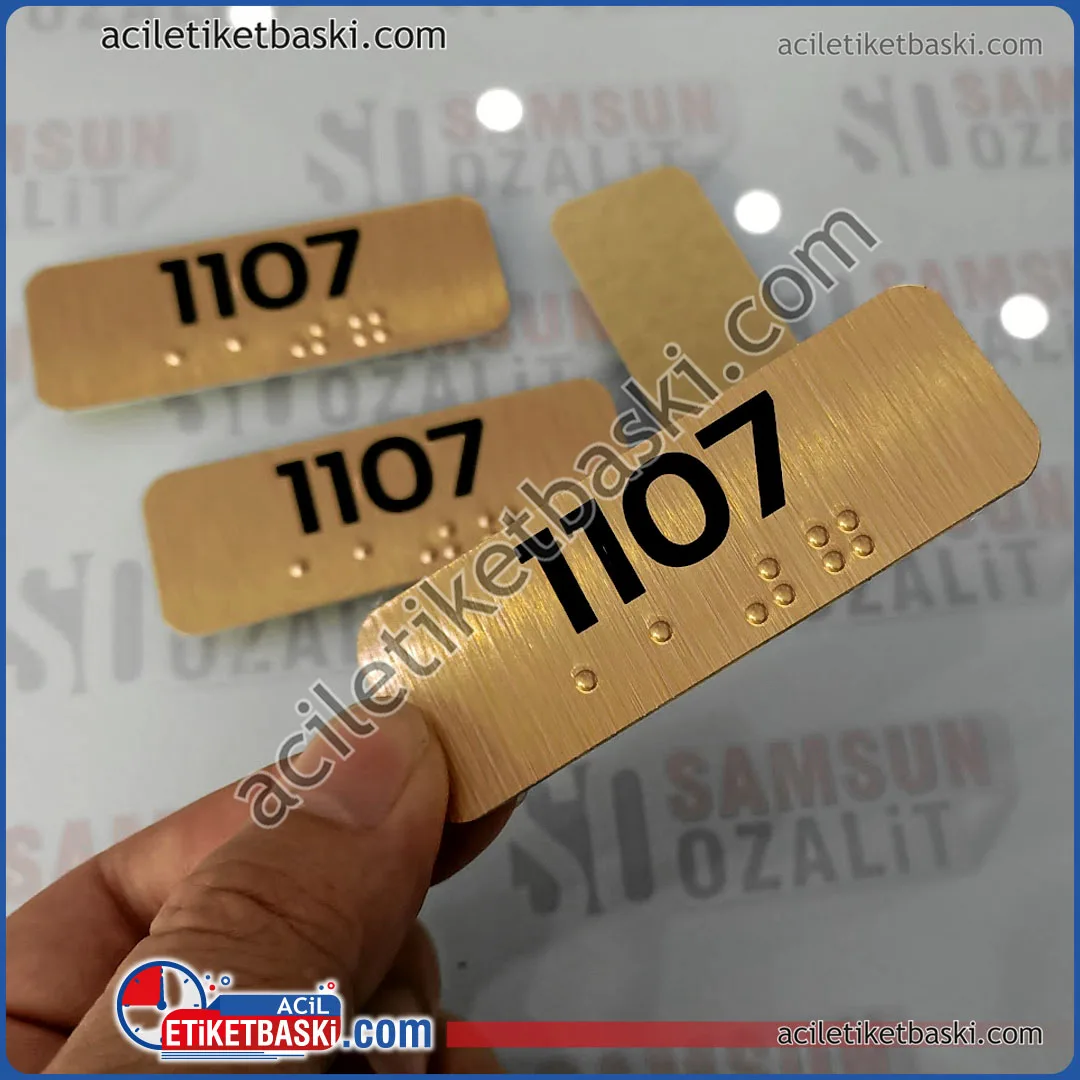 Braille alfabesi ile oda numarası baskısı, otellerde şart olan, yönetmelikte bulunan, görme engelli, oda için kapı numarası baskısı, kabartma metal etiket baskı, tasarım desteği verilir, ebat ve adede göre fiyat alınız, kabartma metal etiket baskısı, acil üretim, aynı gün gönderim yapılır, türkiye ve yurt dışı gönderim yapılır, acil etiket baskı merkezi Room number printing with Braille alphabet, door number printing for visually impaired rooms, which is required in hotels, included in the regulations, embossed metal label printing, design support is provided, get the price according to size and quantity, embossed metal label printing, urgent production, same day shipping made, shipping to Turkey and abroad, urgent label printing center