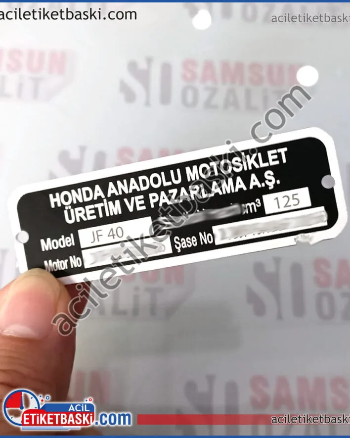 honda motor etiket, honda motosiklet etiket, şasi etiketi, motor numarası, şasi numarası, metal etiket, paslanmaz etiket, perçin delikli, kaliteli ürün, tasarım desteği, aslına uygun, yönetmeliğe uygun ürün, aynı gün gönderim yapılır, acil üretim yapılır, türkiye ve yurt dışı gönderim yapılır honda engine label, honda motorcycle label, chassis label, engine number, chassis number, metal label, stainless label, rivet holes, quality product, design support, original product, product in compliance with the regulations, same day shipping, urgent production, Turkey and Shipping is done abroad