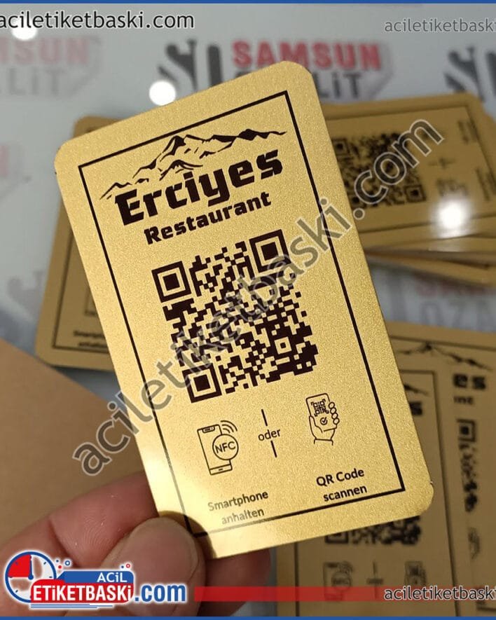 restaurant metal plaka baskısı, masa üzeri QR, masa üzeri NFC etiket baskısı, altın renk, menü yönlendirme etiketi baskısı, kaliteli metal etiket baskı merkezi, acil üretim yapılır, aynı gün kargo olur, tasarım desteği verilir, 84x52 mm kart ebadında metal ürün için birim fiyat yazılmıştır, ebat ve adede göre fiyat alınız