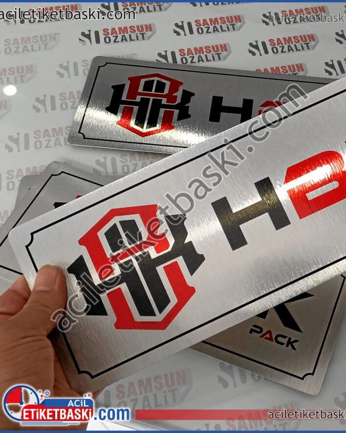 30x12cm ebadında makine üzerine logo baskı etiketi, metal ürün paslanmaz, yazılar kazınmaz silinmez, acil üretim tasarım desteği, makine etiketi, metal makine etiket, logosu, açıklama bilgileri, acil makine etiketi üretimi yapılır, ebat ve adede göre fiyat alınız, acil etiket baskı merkezi, acil metal etiket baskı merkezi, yurt dışı gönderim yapılır, tasarım desteği verilir 30x12cm machine logo printing label, metal product does not rust, writings do not scratch or erase, urgent production design support, machine label, metal machine label, logo, description information, urgent machine label production is done, get a price according to size and quantity, urgent label printing center, urgent metal label printing center, shipping is done abroad, design support is given