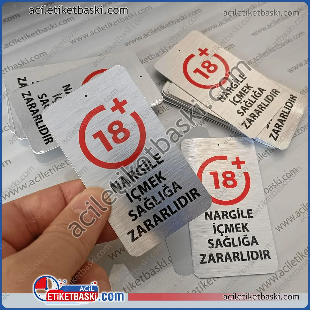 nargile için uyarı etiketi, metal ürün, 9x5cm ebadında, paslanmaz alüminyum, üzeri delikli, zincir ile asılabilir, kaliteli metal etiket, altın ve gümüş renk yapılır nargile için uyarı etiketi, metal ürün, 9x5cm ebadında, paslanmaz alüminyum, üzeri delikli, zincir ile asılabilir, kaliteli metal etiket, altın ve gümüş renk yapılır, kanun yönetmeliğine uygun, nargilelere asmak için, uyarı levhası üretim, imalat, tasarım merkezi