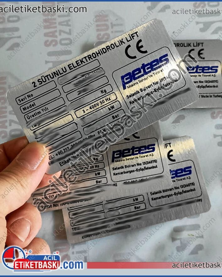 2 sütünlu hidrolk lift metal etiket, petes forklift etiketi, silinen yıpranan, okunmayan etket baskısı, makine etiketi, üretim, imalat, tasarım, kaliteli etiket baskı merkezi