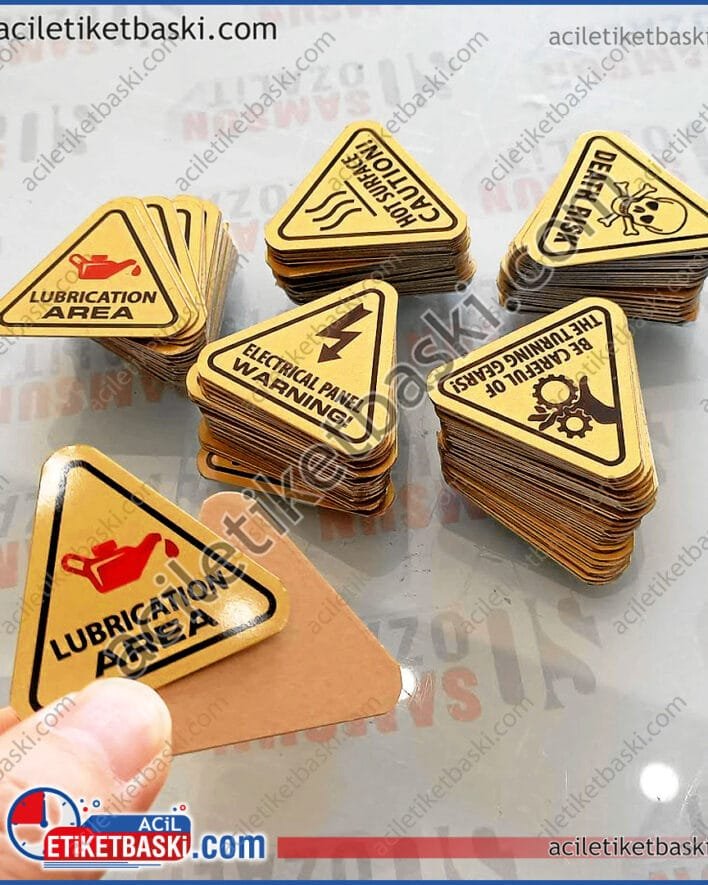 metal, makine, uyarı etiketi, arkası bantlı, köşeler oval, 4 cm ebadında, gerçek metal, paslanmaz, dayanıklı, silinebilir, makine uyarı levhası imalat, üretim, tasarım