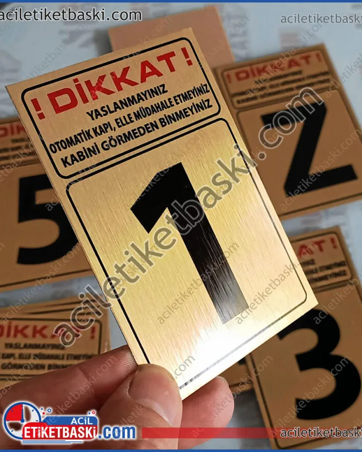 asansör kapı etiketi, her kat için ayrı numara, uyarı levhası, standart ebat, kaliteli, uzun süre dayanır, aparman, site, kurum binaları için uygun, aynı gün gönderim, metal plaka baskı merkezi, metal etiket baskı merkezi, acil etiket basıları, grafik tasarım, destek, arkası bant, dayanıklı, imalat, üretim, tedarik merkezi