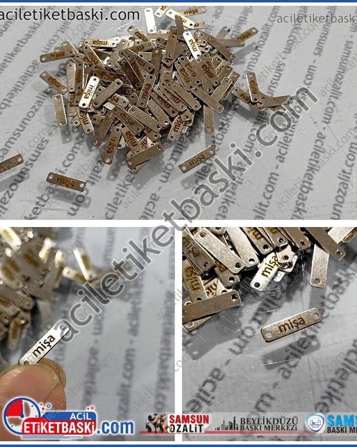 15x4mm pirinç üzeri nikel kaplama, metal etiket, kalın, köşeleri delik, dikim ve ip iğne geçmesine uygun, üzeri lazer kazıma baskı, kaliteli çıkmaz, ömürlük kullanım, metal etiket baskı merkezi