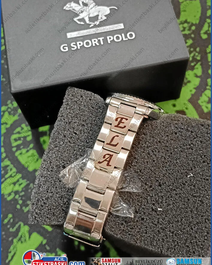 saat kordonuna baskı, metal lazer kazıma, isme özel saat kordonu, kalıcı lazer markalama, hediyelik eşya baskı, çelik kordon isim yazma, numune lazer baskı, kişiye özel metal baskı